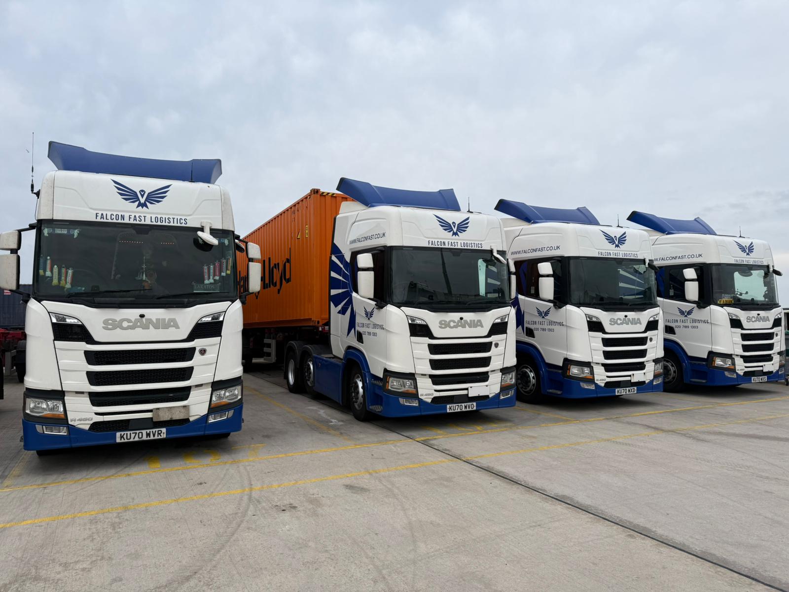 Falcon Fast Logistics trucks with a Hapag-Lloyd container